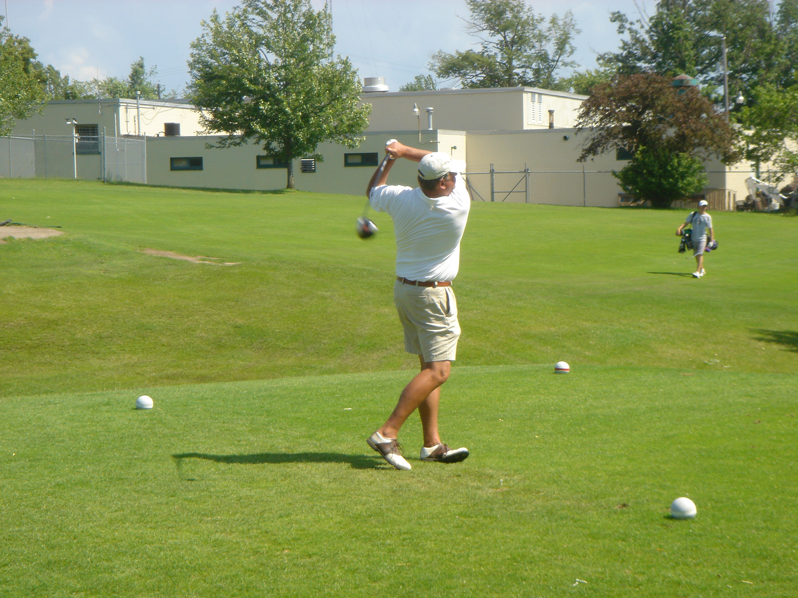 Jim Schreck Tees Off On 18th Hole During Same Match